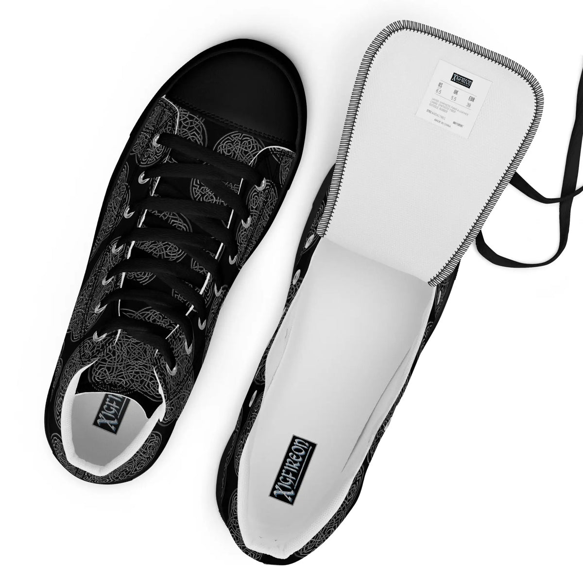 A view from above of a pair of Xigfireon black soled canvas high tops featuring the Greyscale iteration of the Reach Of The Spirit Celtic knot pattern. The tongue on the right shoe is opened up to better reveal the inside of the shoe.