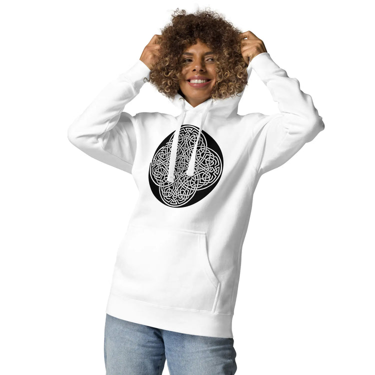 A young woman wearing a white Xigfireon graphic hoodie featuring the Black & White Circle iteration of the Reach Of The Spirit Celtic knot design. The Reach Of The Spirit Celtic knot represents our magnificent Mother Earth.