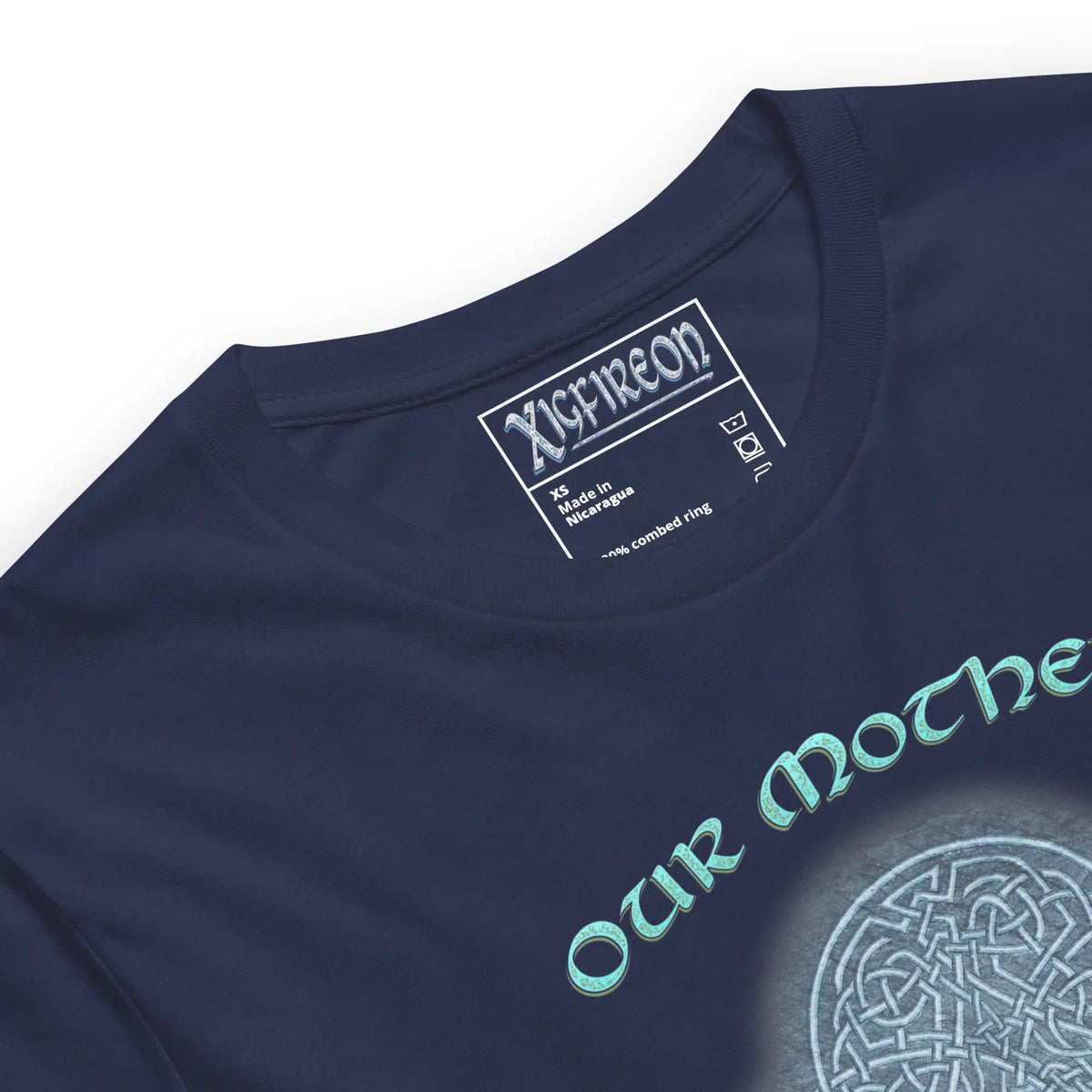 A close up of a navy blue graphic t-shirt featuring the Blue Slate iteration of the Reach Of The Spirit Celtic knot design along with a message in a Celtic font: "Our Mother, Cherish Her".