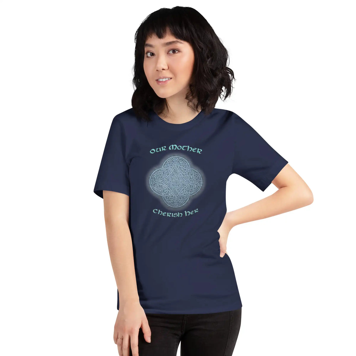 A young woman wearing a navy blue Xigfireon graphic t-shirt featuring the Blue Slate iteration of the Reach Of The Spirit Celtic knot design along with a message in a Celtic font: "Our Mother, Cherish Her".