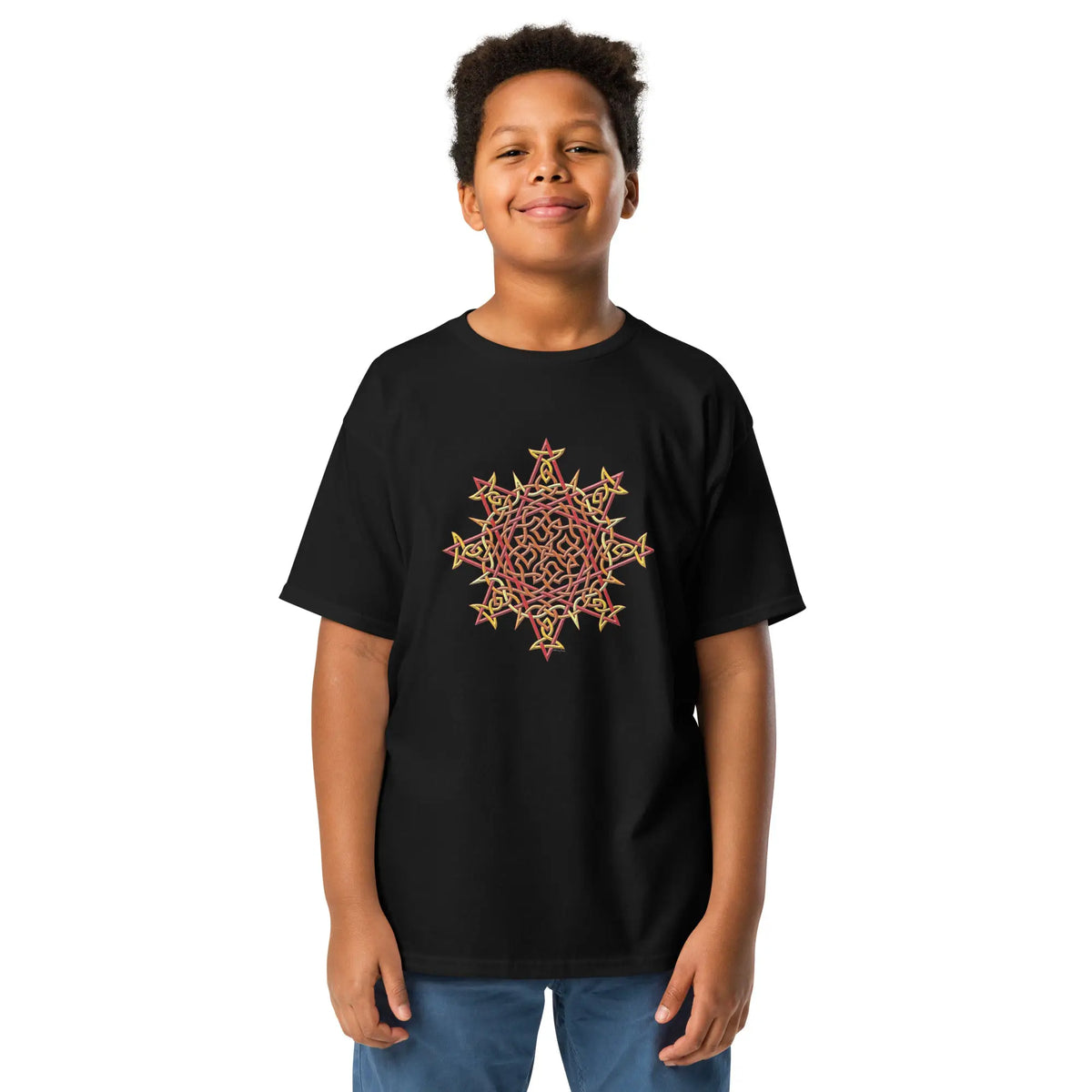 A young boy wearing a black Xigfireon kids graphic t-shirt featuring the Fire Colour iteration of the Morning Star Fire Celtic knot design. The Morning Star Fire Celtic knot represents the Sun.