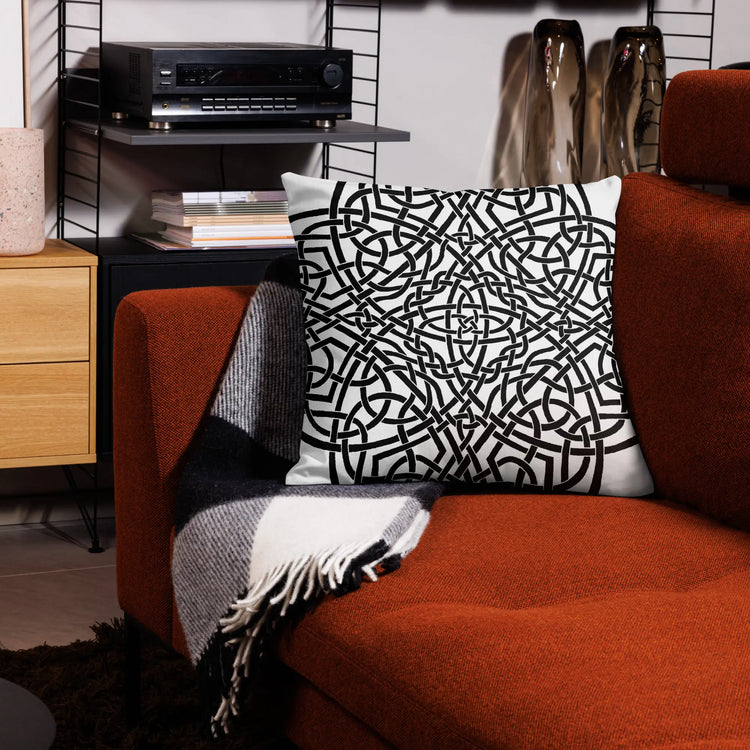 The back side of a 22 inch by 22 inch Xigfireon pillowcase featuring the inverted Black & White Súmáilte iteration of the Reach Of The Spirit Celtic knot design. The Reach Of The Spirit Celtic knot represents Mother Earth.