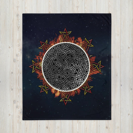 A 50 inch by 60 inch Xigfireon throw blanket featuring the Eclipsed iteration of the Morning Star Fire Celtic knot design. Inspired by the 2023 Annular Solar Eclipse.