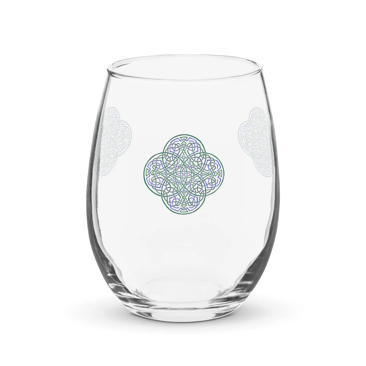 The front side of a stemless wine glass featuring the Living Colour iteration of the Reach Of The Spirit Celtic knot design.