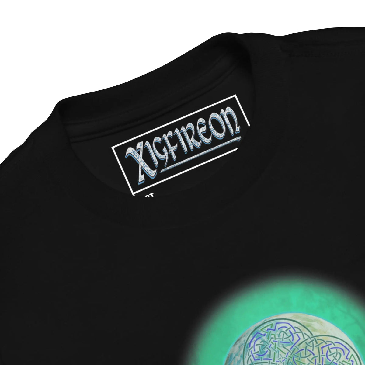 A close-up view of the logo and design on a black Xigfireon toddler graphic t-shirt featuring the Deep Forest iteration of the Reach Of The Spirit Celtic knot design. The Reach Of The Spirit Celtic knot represents Mother Earth.