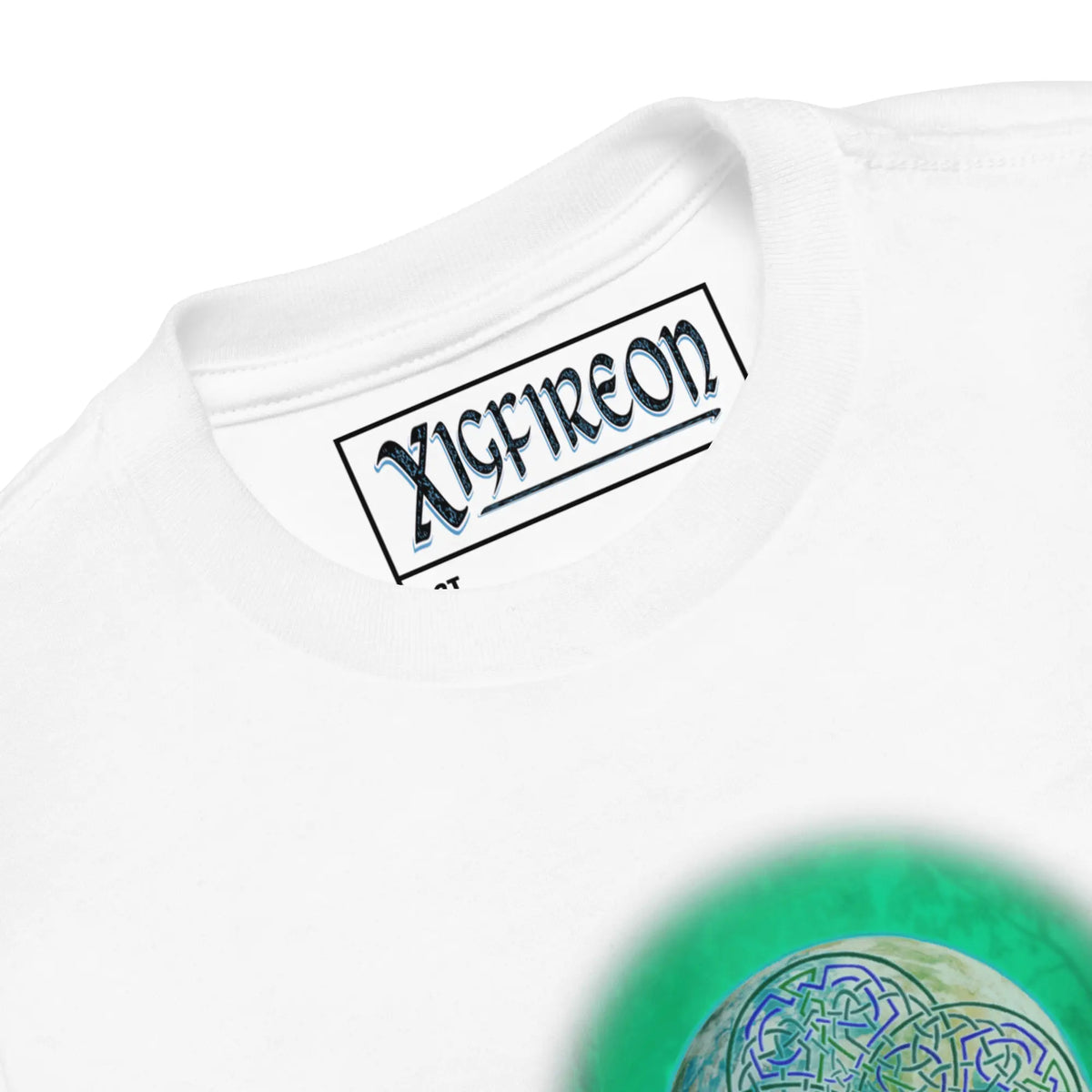A close-up view of the logo and design on a white Xigfireon toddler graphic t-shirt featuring the Deep Forest iteration of the Reach Of The Spirit Celtic knot design. The Reach Of The Spirit Celtic knot represents Mother Earth.