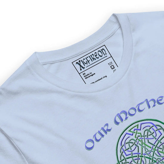 A close up of a baby blue Xigfireon graphic t-shirt featuring the Living Colour iteration of the `Reach Of The Spirit` Celtic knot design along with a message in a Celtic font: "Our Mother, Cherish Her".