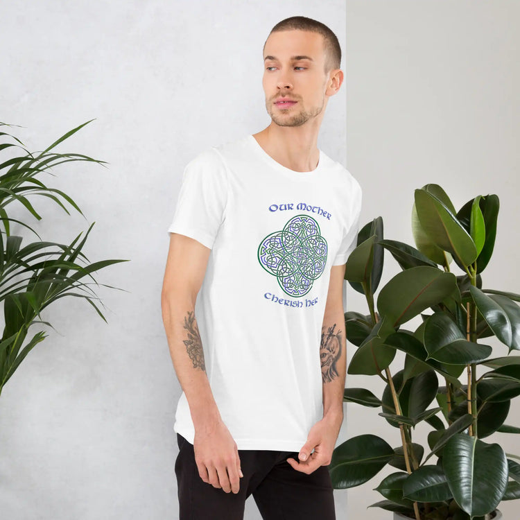 A young man wearing a white Xigfireon graphic t-shirt featuring the Living Colour iteration of the `Reach Of The Spirit` Celtic knot design along with a message in a Celtic font: "Our Mother, Cherish Her".