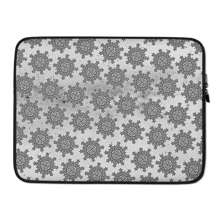 A 15 inch graphic laptop sleeve featuring the Inverted Black & White Solid Cosmos iteration of the `Morning Star Fire` Celtic knot pattern.