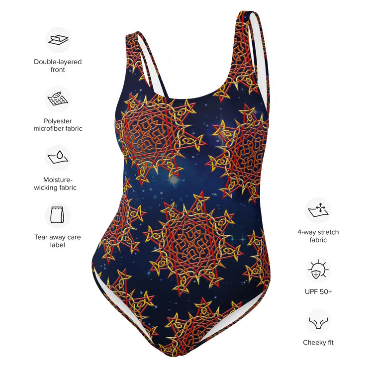 A list of product features surrounding a Xigfireon graphic swimsuit featuring the Fire Colour Cosmos patterned series of the `Morning Star Fire` Celtic knot design. Features include double-layered front, polyester microfiber fabric, moisture-wicking fabric, tear away care label, 4-way stretch, UPF 50+, and cheeky fit.