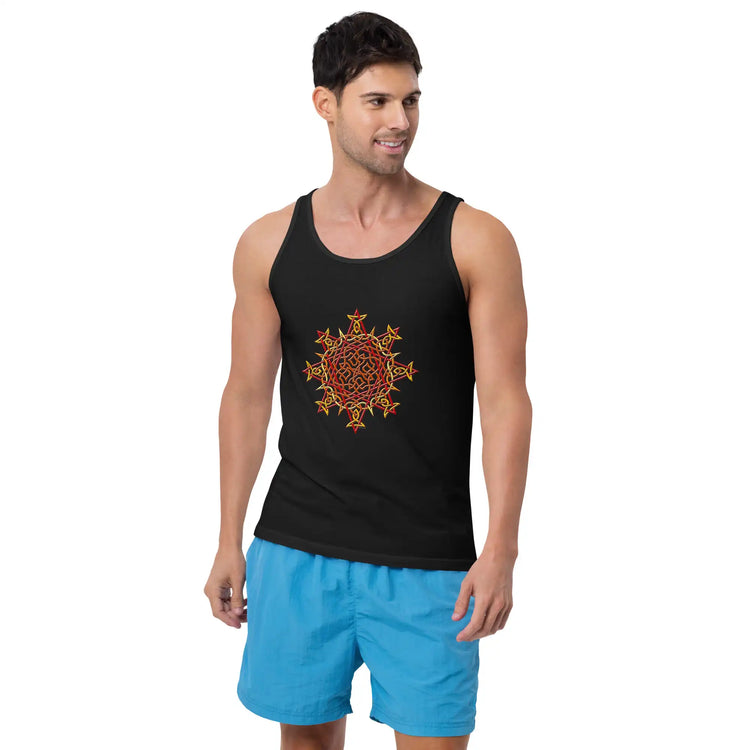 A young man wearing blue shorts and a black graphic tank top featuring the Fire Colour iteration of the `Morning Star Fire` Celtic knot design.