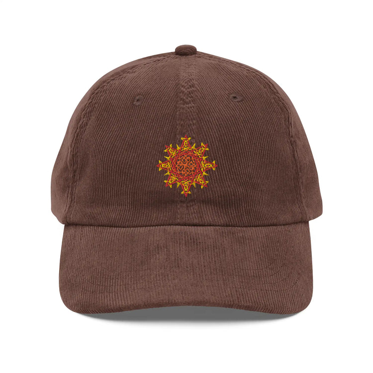 The front side of a brown Xigfireon vintage corduroy cap embroidered with the Fire Colour iteration of the `Morning Star Fire` Celtic knot design.