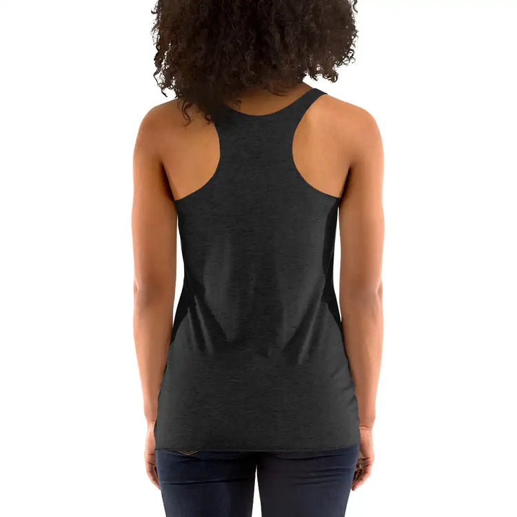 A young woman, viewed from behind, wearing a vintage black Xigfireon graphic women&