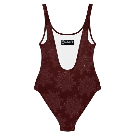 The back side of a Xigfireon graphic swimsuit featuring the Midnight Red Cosmos patterned series of the `Morning Star Fire` Celtic knot design.