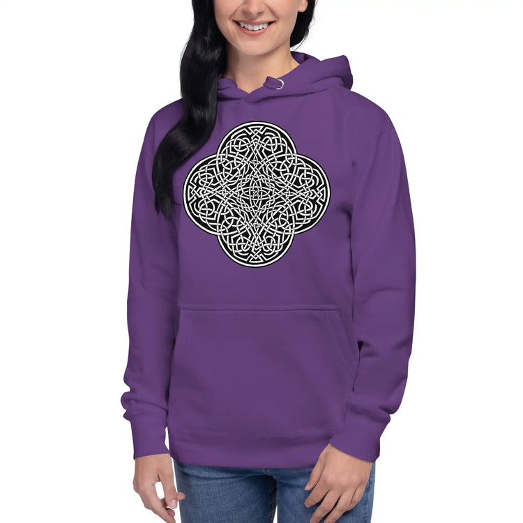 A young woman wearing a purple Xigfireon graphic hoodie featuring the Black & White Solid iteration of the `Reach Of The Spirit` Celtic knot design. The `Reach Of The Spirit` Celtic knot represents the Earth.