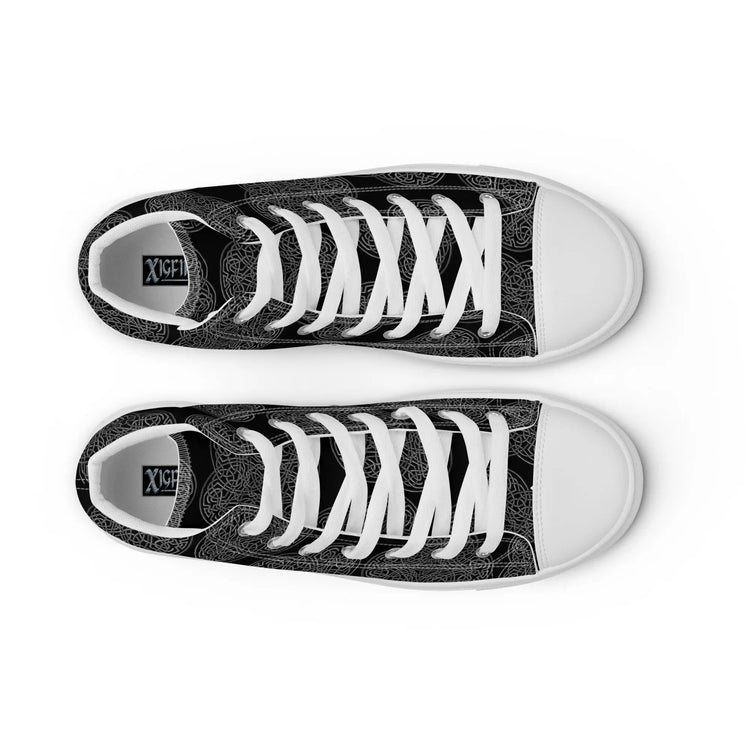 A view from above of a pair of black canvas high tops featuring the Greyscale iteration of the `Reach Of The Spirit` Celtic knot pattern. The Xigfireon logo on the insole is visible.
