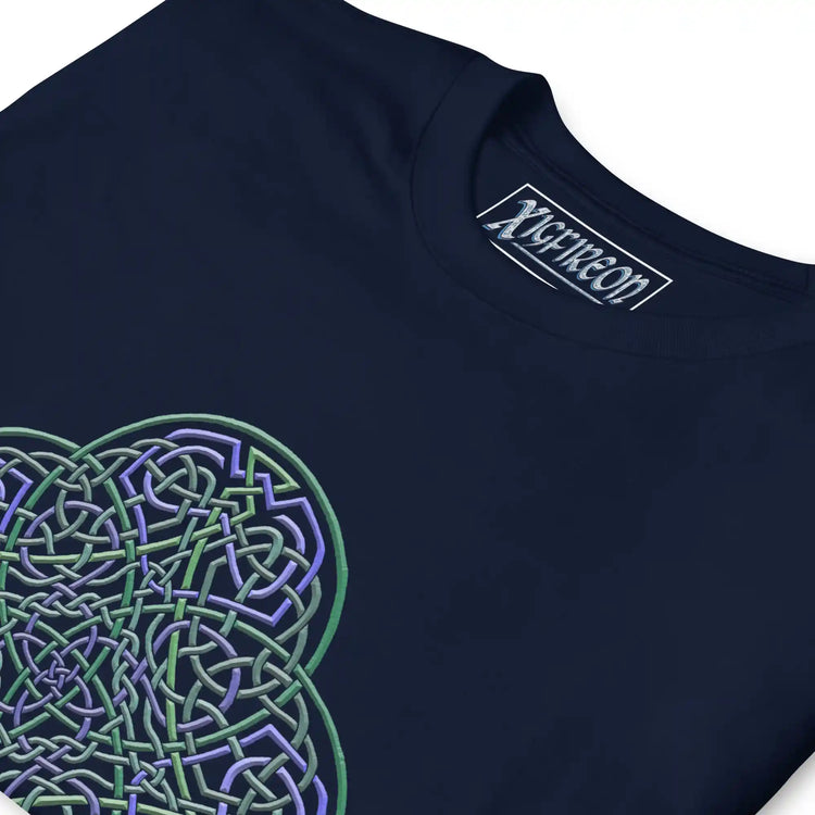 A close-up view of a navy blue Xigfireon graphic t-shirt featuring the Living Colour iteration of the `Reach Of The Spirit` Celtic knot design. The `Reach Of The Spirit` Celtic knot symbolizes the Earth.