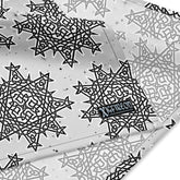 A close up view of the Xigfireon logo on a large sized (25.25 inch x 25.25 inch) Morning Star Fire Black and White Solid Cosmos Inverted bandana.