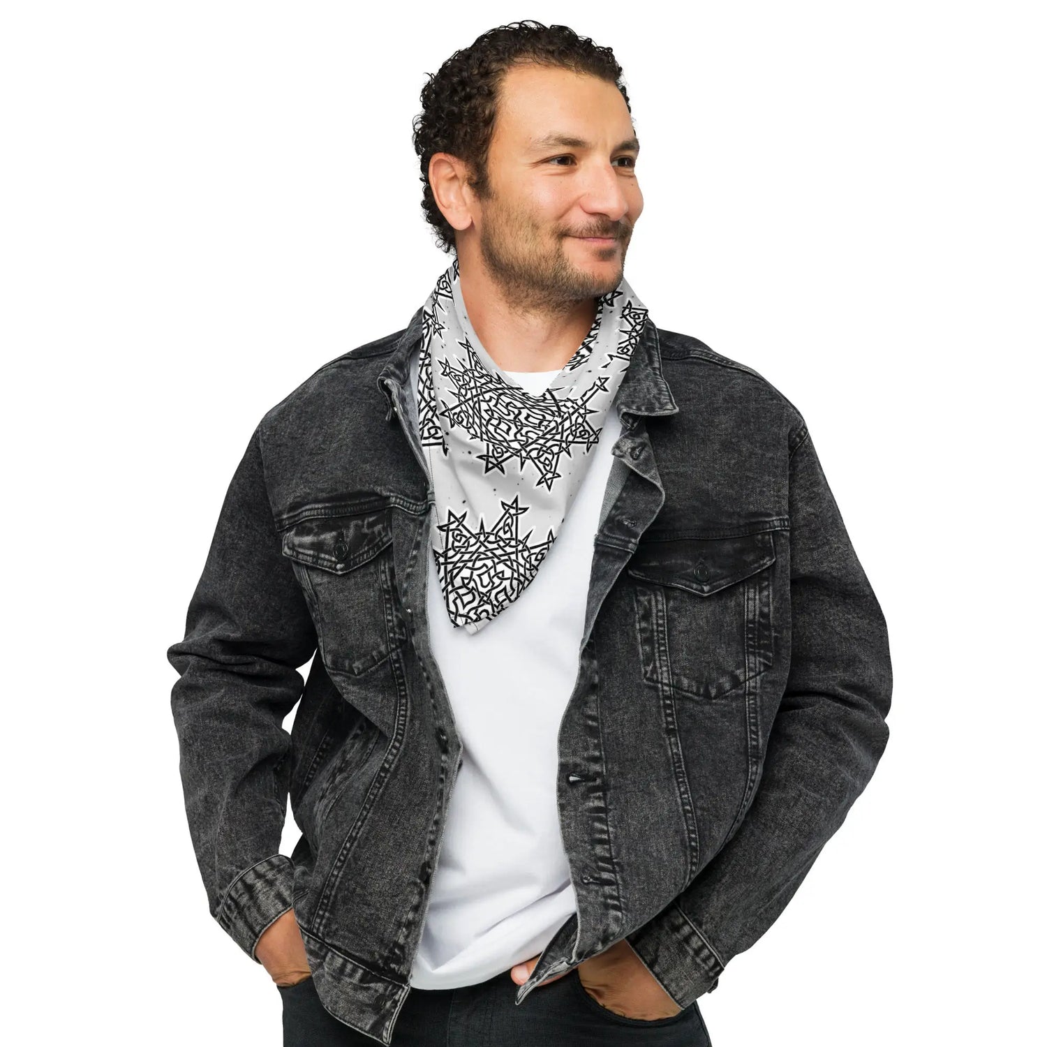 A young man wearing a Xigfireon bandana adorned with the Morning Star Fire Black and White Solid Cosmos Inverted Celtic knot pattern.