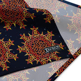 A close up view of the Xigfireon logo on a large sized (25.25 inch x 25.25 inch) `Morning Star Fire` Fire Colour Cosmos bandana.