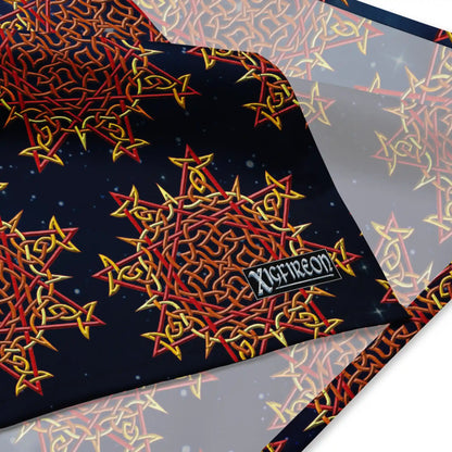 A close up view of the Xigfireon logo on a large sized (25.25 inch x 25.25 inch) bandana featuring the Fire Colour Cosmos iteration of the Morning Star Fire Celtic knot.