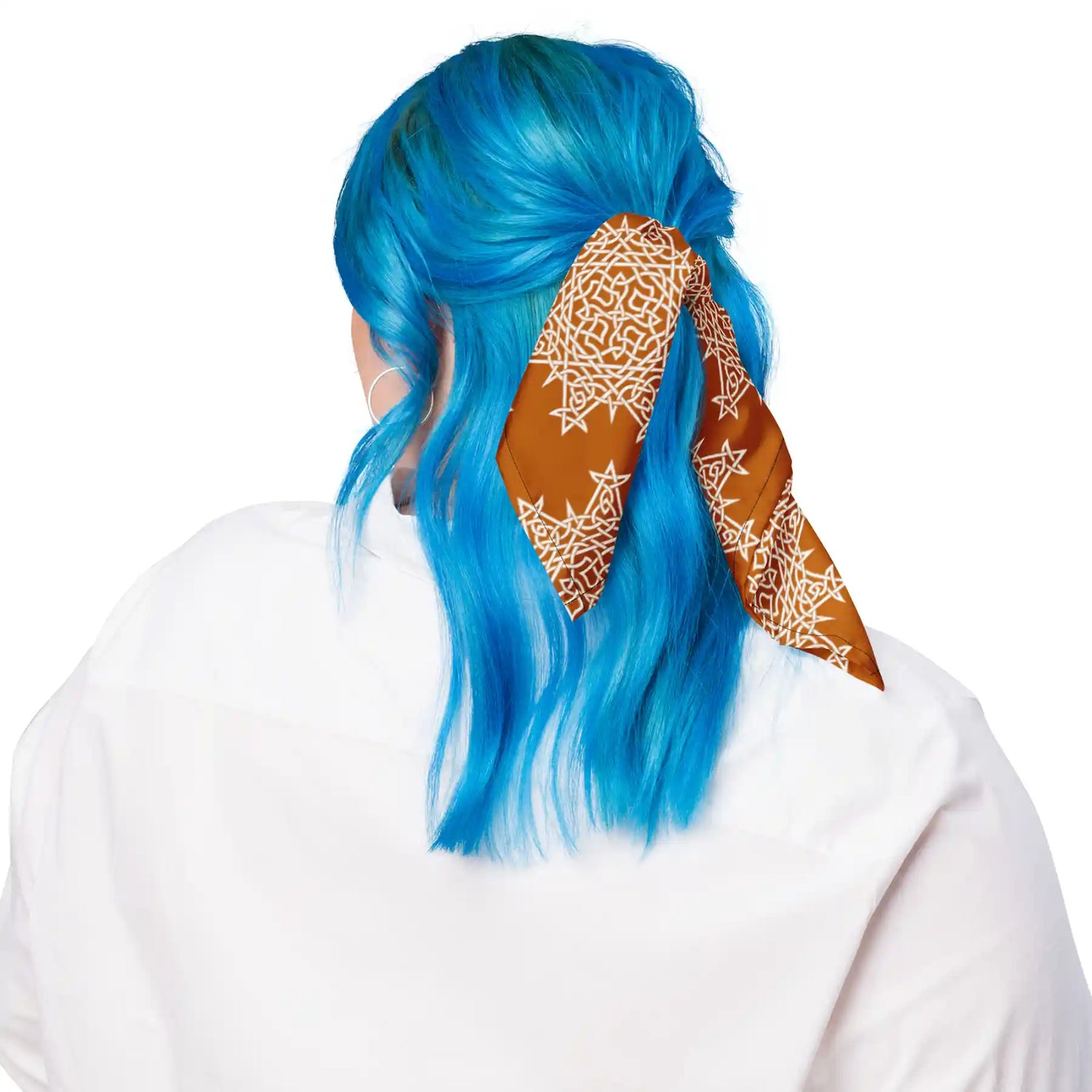 Woman with blue hair wearing a Xigfireon bandana featuring Orange and White patterned series of the `Morning Star Fire` Celtic knot design.
