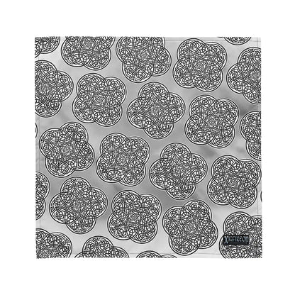 A medium Xigfireon bandana adorned with the  Black and White Solid Forest Inverted patterned series of the Reach Of The Spirit Celtic knot design.