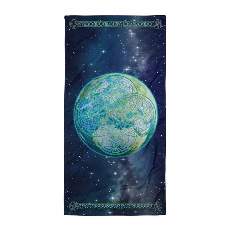 A Xigfireon bath and beach towel featuring the Sacred Planet iteration of the Reach Of The Spirit Celtic knot design displayed above a beautiful view of the Earth from space.