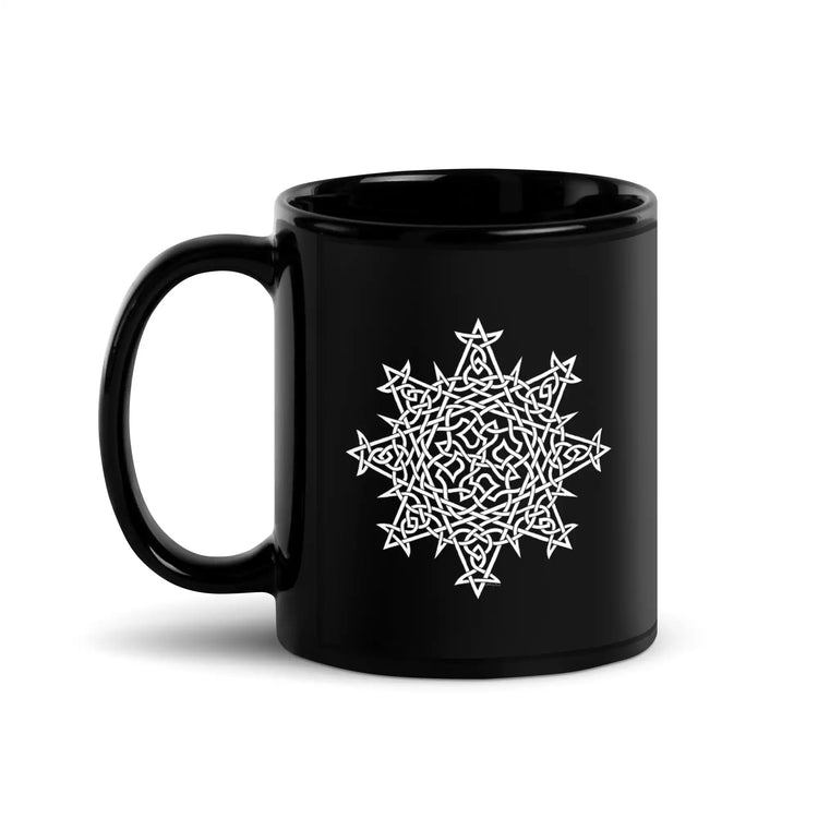A Xigfireon black glossy 11oz mug featuring the Black & White Solid iteration of the Morning Star Fire Celtic knot design. This Celtic knot symbolizes Father Sun.