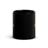 The front side of a Xigfireon black ceramic 11oz mug featuring the Fire Colour iteration of the Morning Star Fire Celtic knot design. This Celtic knot symbolizes Father Sun.