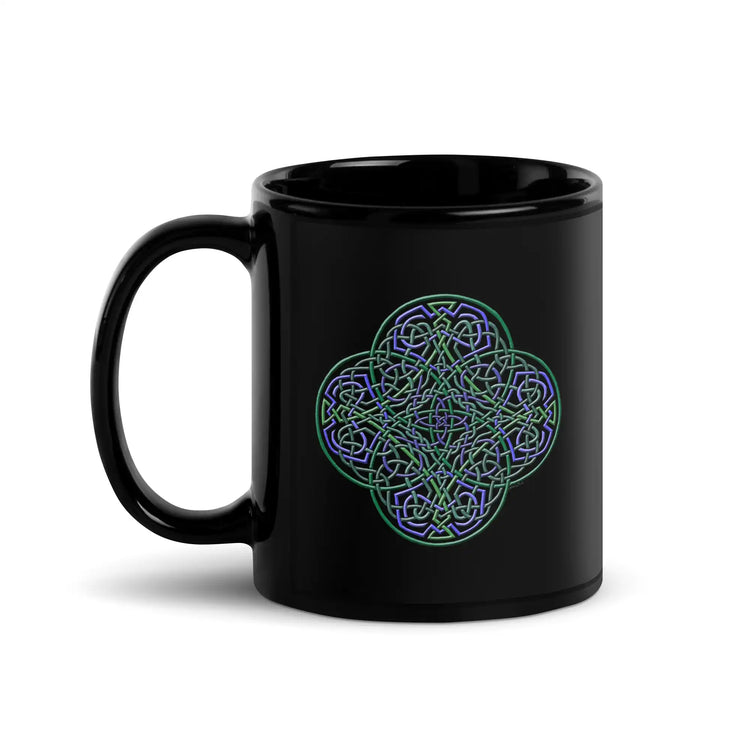 A Xigfireon black ceramic 11oz mug featuring the Living Colour iteration of the Reach Of The Spirit Celtic knot design. This Celtic knot symbolizes Mother Earth.