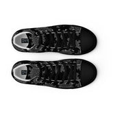 A view from above of a pair of Xigfireon black soled canvas high tops featuring the Greyscale iteration of the Morning Star Fire Celtic knot pattern. The Xigfireon logo is visible inside each shoe.