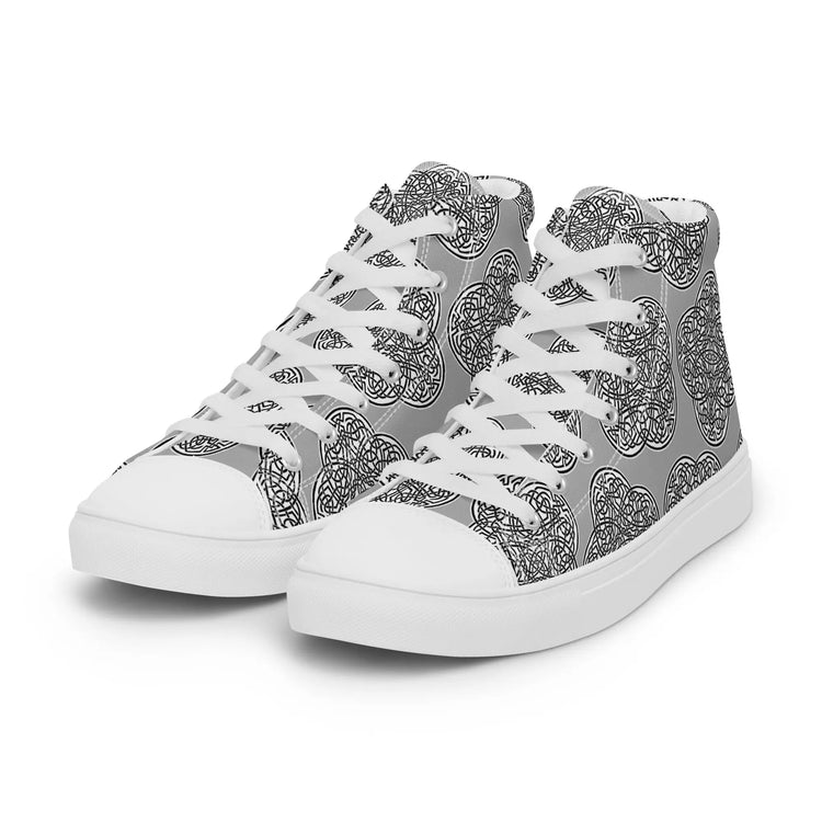 A pair of Xigfireon canvas high tops featuring the Inverted Black & White Solid iteration of the Reach of The Spirit Celtic knot pattern.