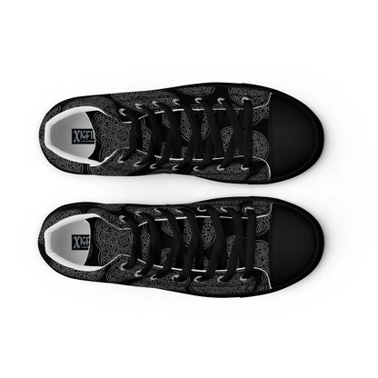 A view from above of a pair of Xigfireon black soled canvas high tops featuring the Greyscale iteration of the Reach Of The Spirit Celtic knot pattern. The Xigfireon logo is visible inside each shoe.