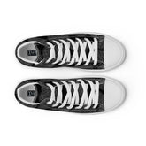A view from above of a pair of black canvas high tops featuring the Greyscale iteration of the Reach Of The Spirit Celtic knot pattern. The Xigfireon logo on the insole is visible.
