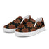 A pair of Xigfireon canvas slip-on shoes featuring the Fire Colour on Black iteration of the Morning Star Fire Celtic knot pattern. The Morning Star Fire Celtic knot represents the Sun.