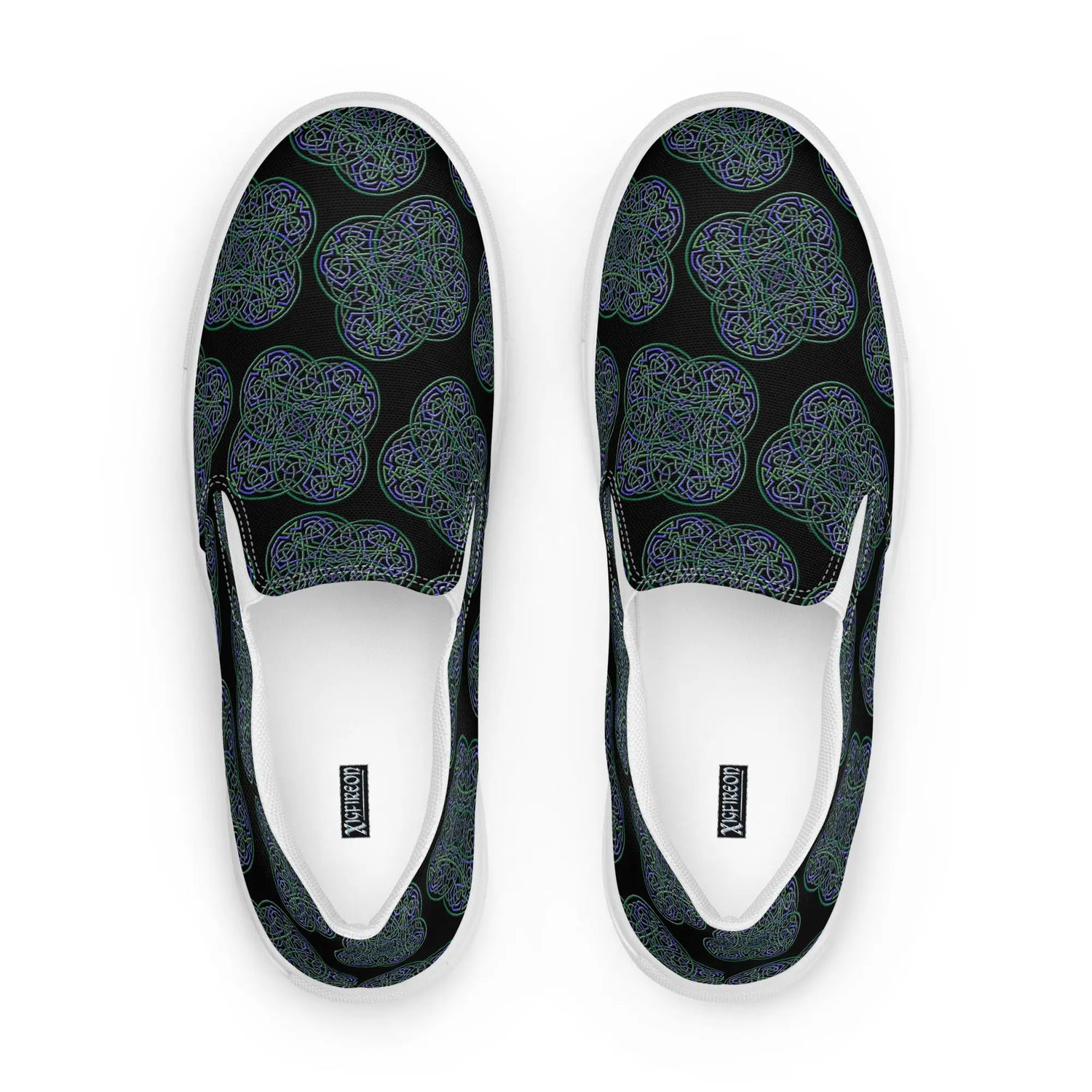 A view from above of a pair of Xigfireon canvas slip-on shoes featuring the Living Colour on Black iteration of the Reach Of The Spirit Celtic knot pattern. The Xigfireon logo is visible inside each shoe.