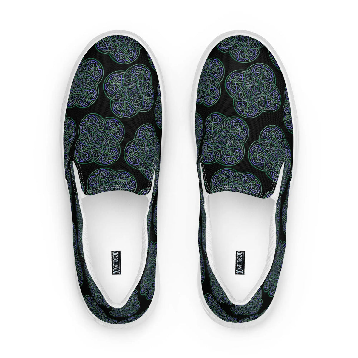 A view from above of a pair of Xigfireon canvas slip-on shoes featuring the Living Colour on Black iteration of the Reach Of The Spirit Celtic knot pattern. The Xigfireon logo is visible inside each shoe.