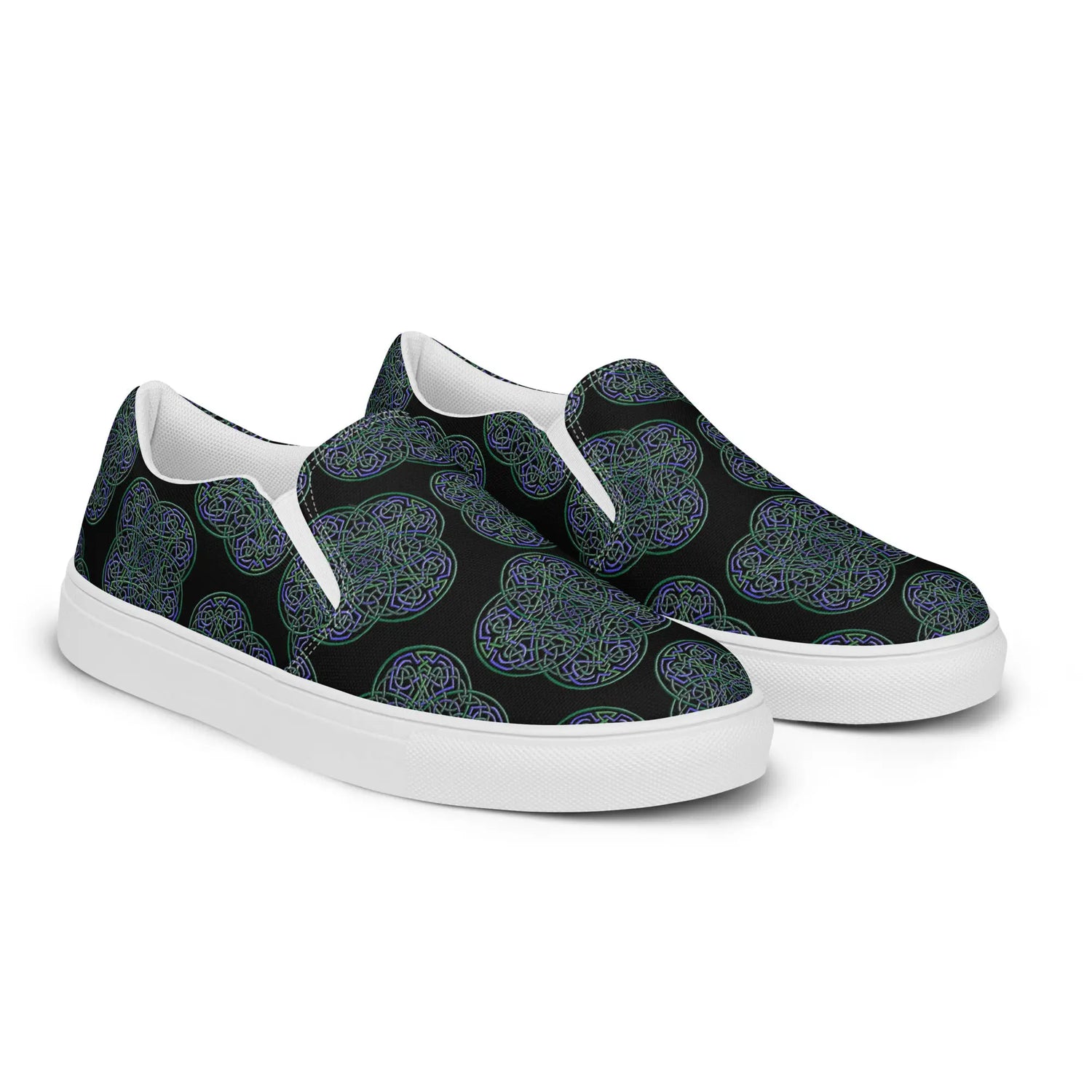 A pair of Xigfireon canvas slip-on shoes featuring the Living Colour on Black iteration of the Reach Of The Spirit Celtic knot pattern. The Reach Of The Spirit Celtic knot represents the Earth.