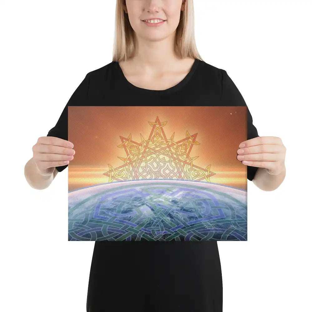 A young woman holding a 12 inch x 16 inch canvas print of the Derivation II Celtic knot design, which symbolizes the Sun and the Earth and their cosmic dance.