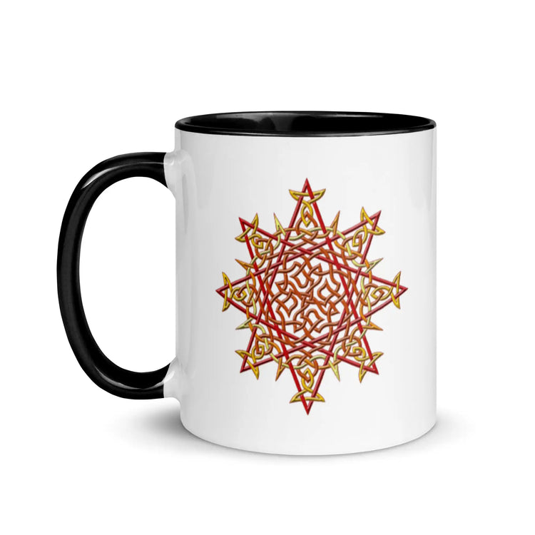A Xigfireon white ceramic 11oz mug featuring the Fire Colour iteration of the Morning Star Fire Celtic knot design, with black handle and inside. This Celtic knot symbolizes Father Sun.