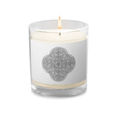 A Xigfireon glass jar soy wax candle featuring the Black & White Hollow iteration of the Reach Of The Spirit Celtic knot design. The Reach Of The Spirit Celtic knot symbolizes Mother Earth.