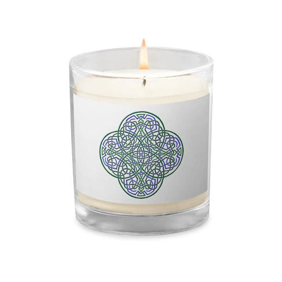 A Xigfireon glass jar soy wax candle featuring the Living Colour iteration of the Reach Of The Spirit Celtic knot design. The Reach Of The Spirit Celtic knot symbolizes Mother Earth.