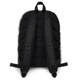 A view of the straps on a Xigfireon graphic backpack featuring the Black & White Solid Cosmos Inverted iteration of the `Morning Star Fire` Celtic knot pattern. The `Morning Star Fire` Celtic knot symbolizes the Sun.