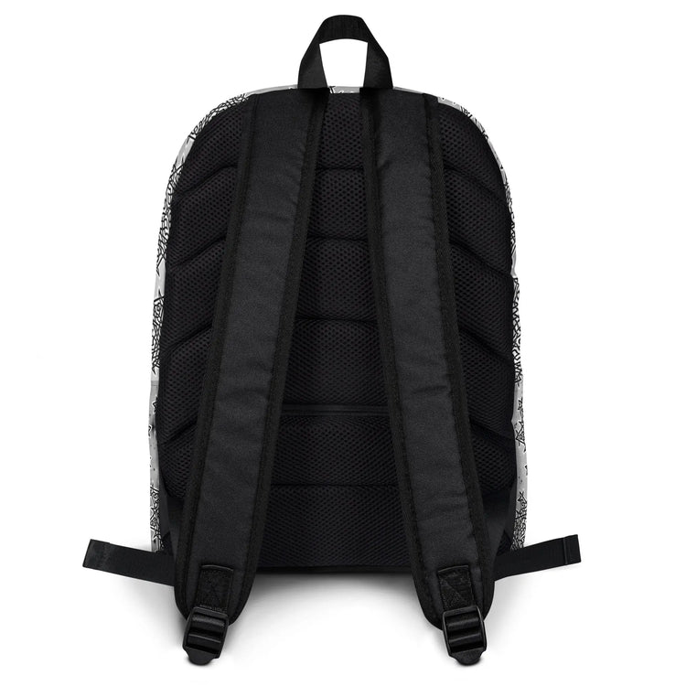 A view of the straps on a Xigfireon graphic backpack featuring the Black & White Solid Cosmos Inverted iteration of the `Morning Star Fire` Celtic knot pattern. The `Morning Star Fire` Celtic knot symbolizes the Sun.