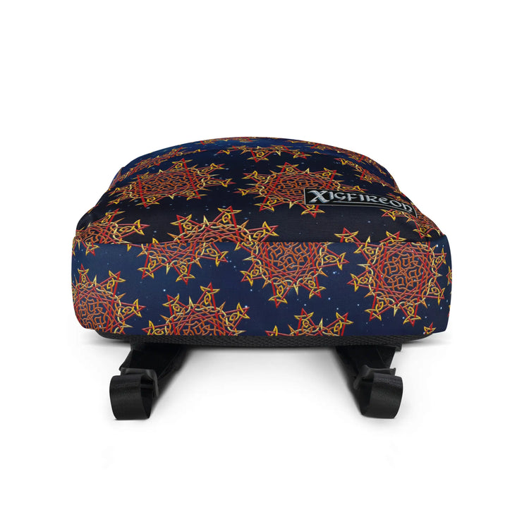 A view of the bottom of a Xigfireon graphic backpack featuring the Fire Colour Cosmos iteration of the `Morning Star Fire` Celtic knot pattern. The `Morning Star Fire` Celtic knot symbolizes the Sun.