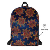 A view of the back of a Xigfireon graphic backpack featuring the Fire Colour Cosmos iteration of the `Morning Star Fire` Celtic knot pattern. A simple graphic and arrow indicate the location of the inside pocket.