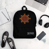 A view of a few new school year essentials, including a Xigfireon graphic backpack featuring the Fire Colour iteration of the `Morning Star Fire` Celtic knot design.