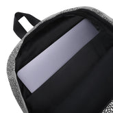A view of the laptop pocket inside a Xigfireon graphic backpack featuring the Black & White Solid Forest Inverted iteration of the `Reach Of The Spirit` Celtic knot pattern.