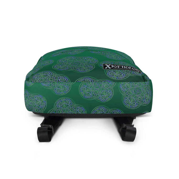 A view of the bottom of a Xigfireon graphic backpack featuring the Living Colour Forest Inverted iteration of the `Reach Of The Spirit` Celtic knot pattern. The `Reach Of The Spirit` Celtic knot symbolizes the Earth.